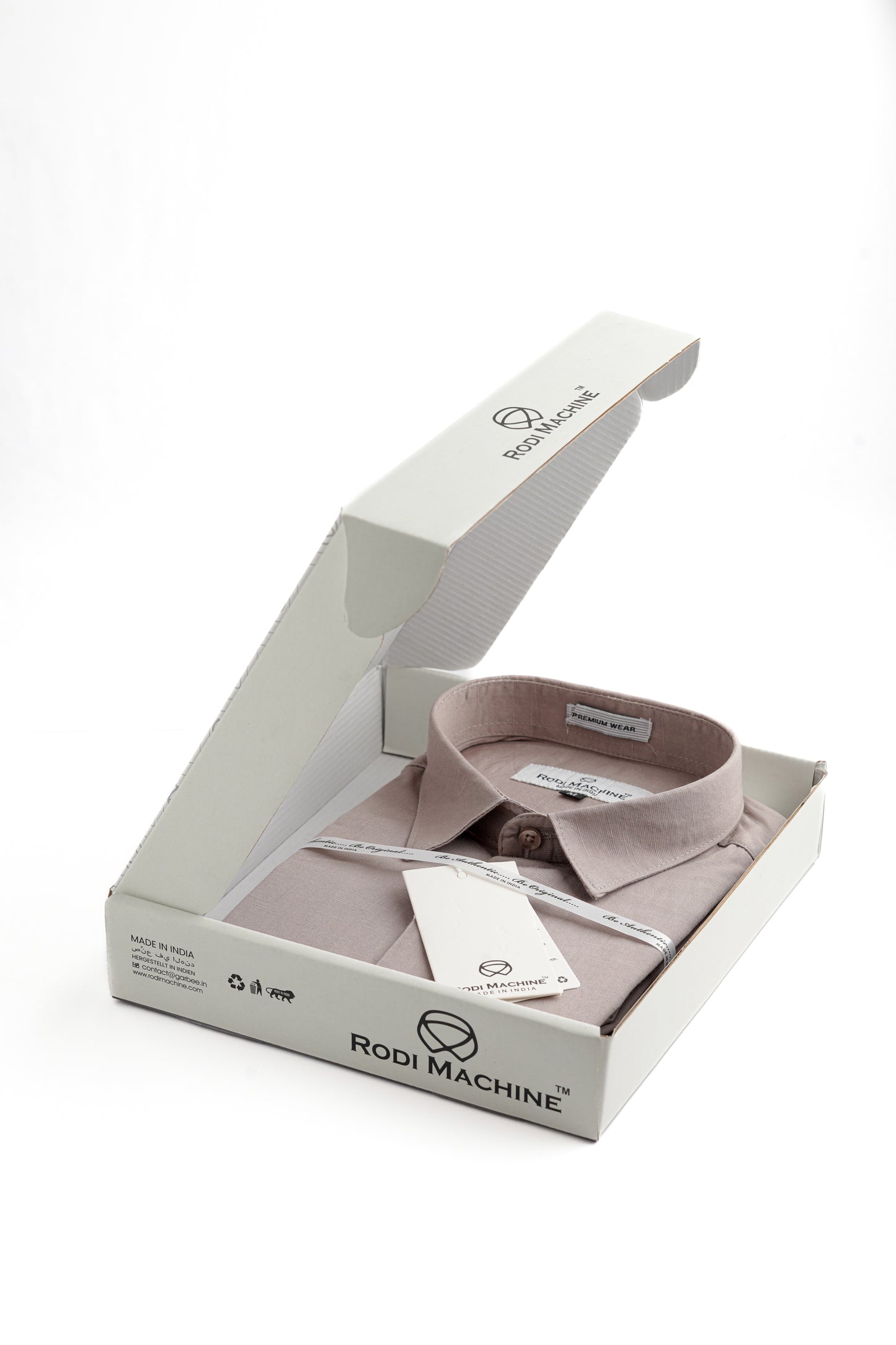 Dark Grey Rodi Machine shirt in an open box with 'Rodi Machine' branding on a white background