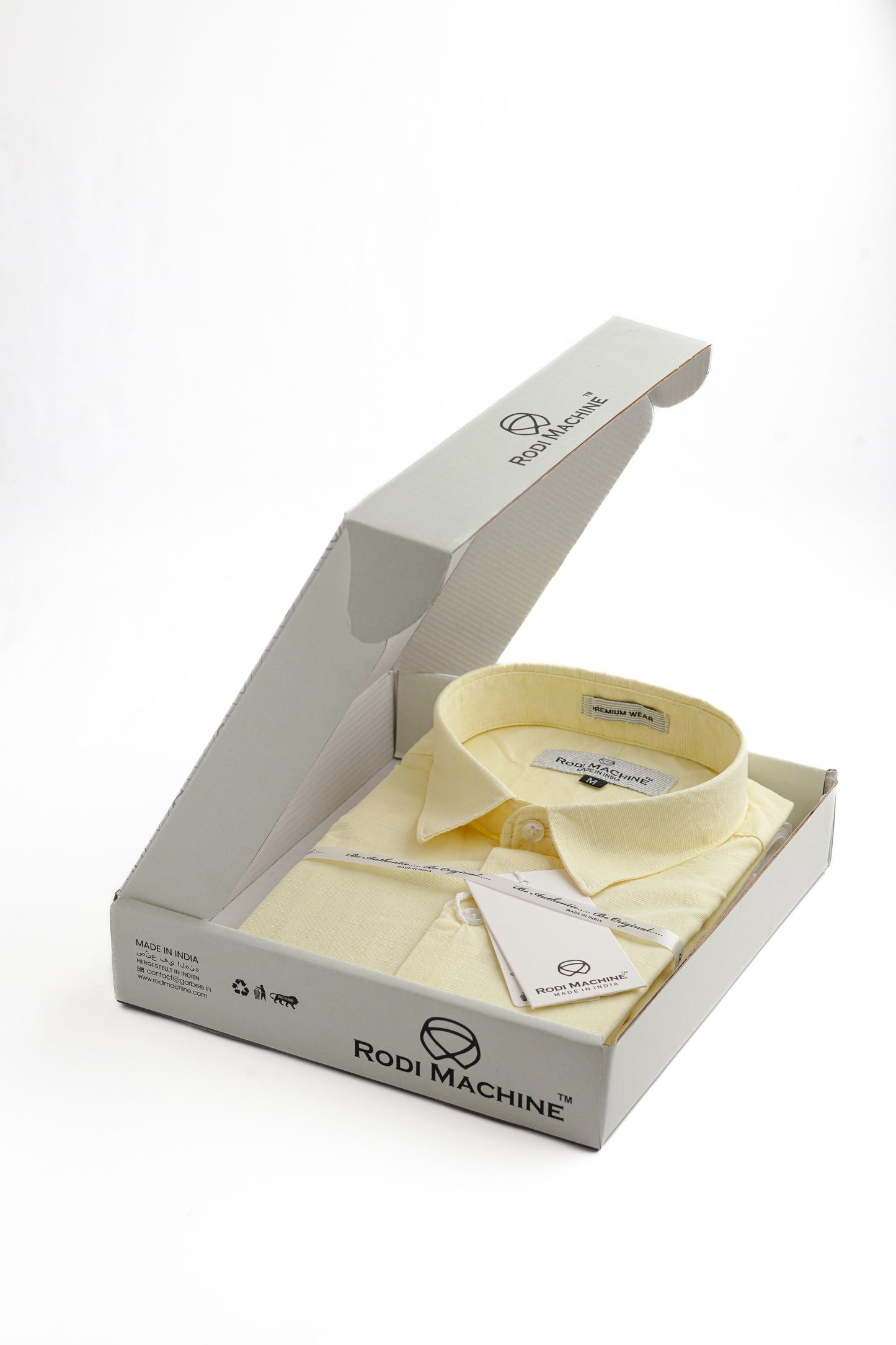 Yellow colour Rodi Machine shirt in an open box with 'Rodi Machine' branding on a white background
