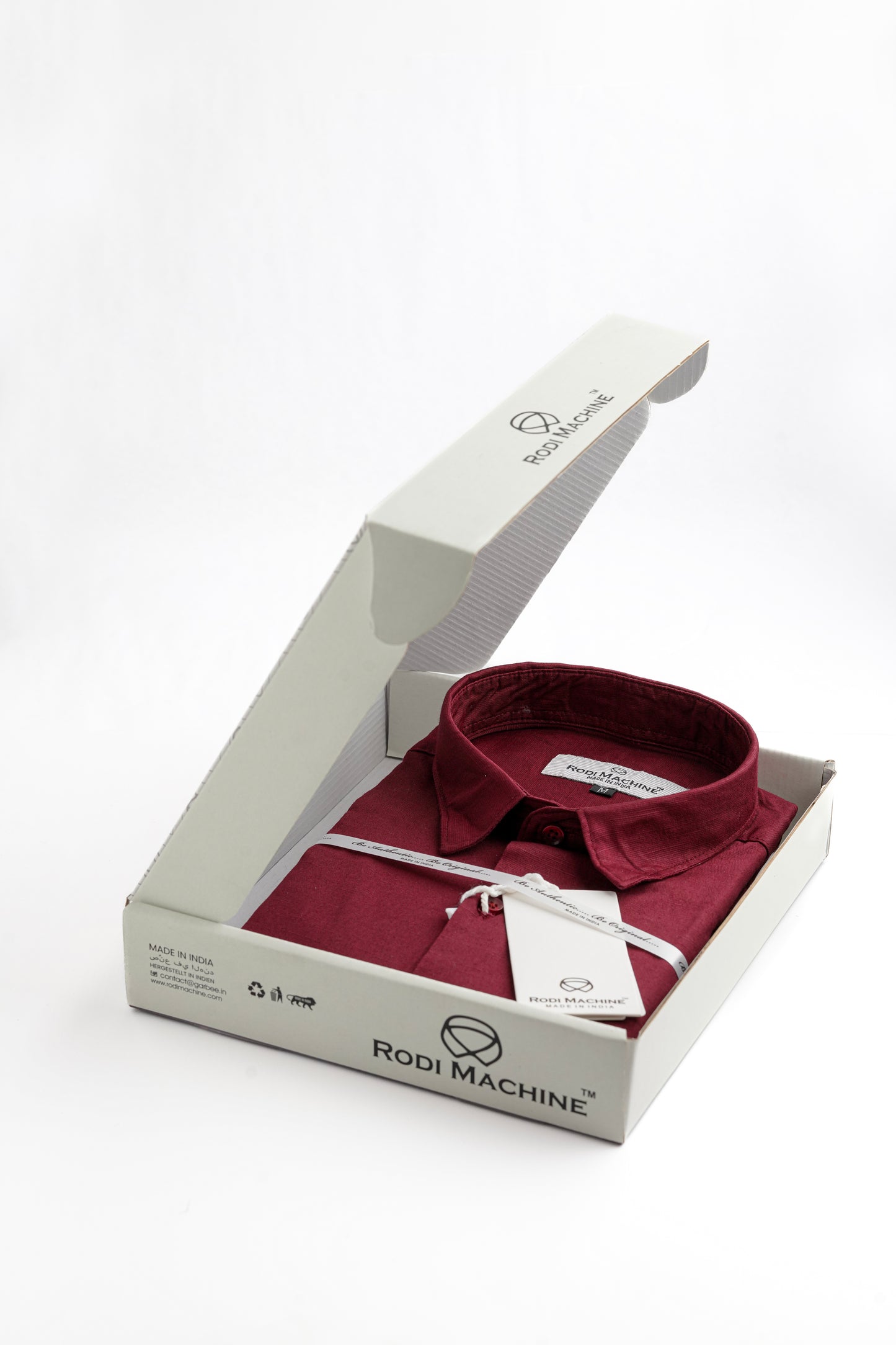 Maroon colour Rodi Machine shirt in an open white box with 'Rodi Machine' branding on a white background