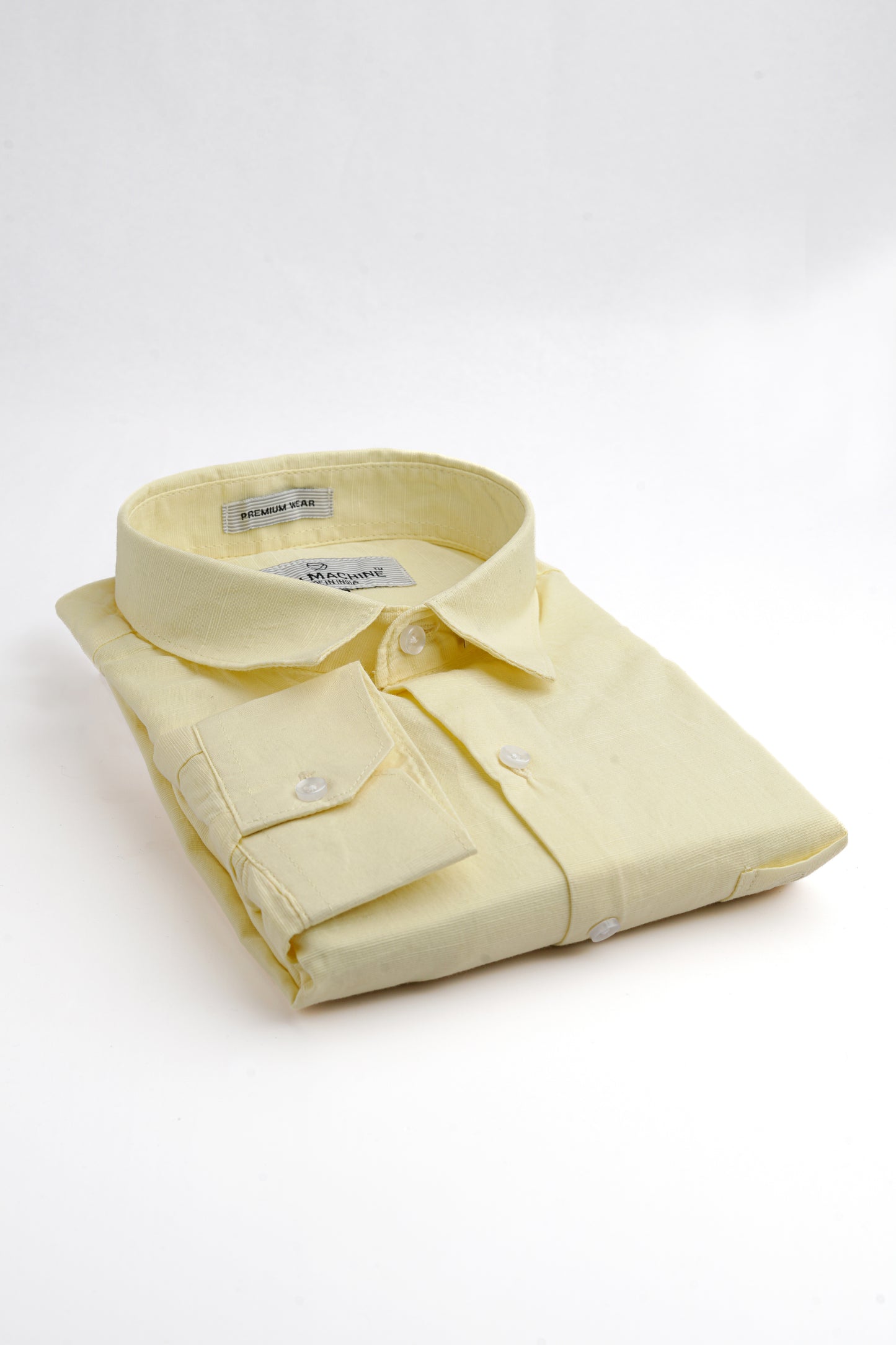 Folded Yellow colour Rodi Machine shirt on a white background