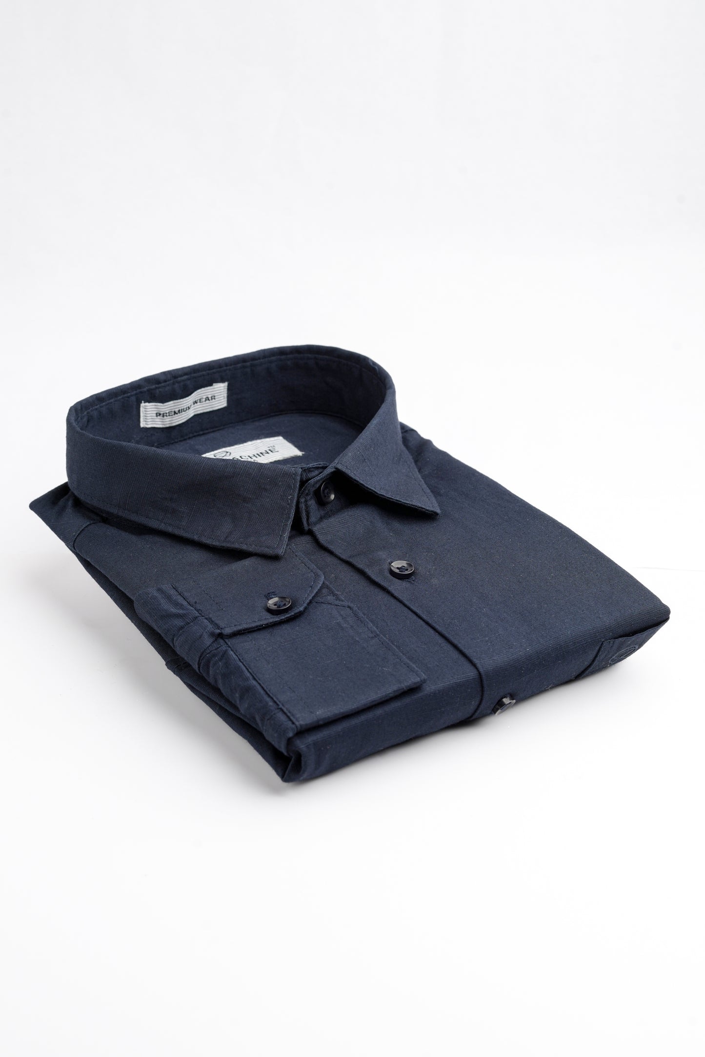 Folded Navy Blue colour Rodi Machine shirt on a white background