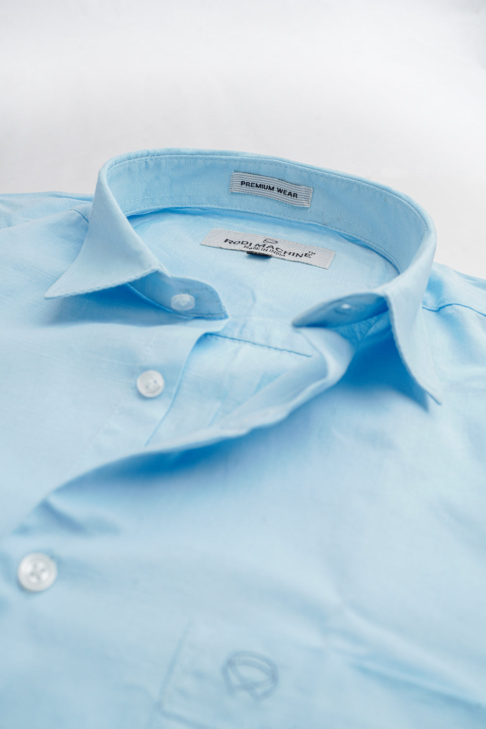 Sky Blue colour Rodi Machine shirt with collar and buttons on a white background