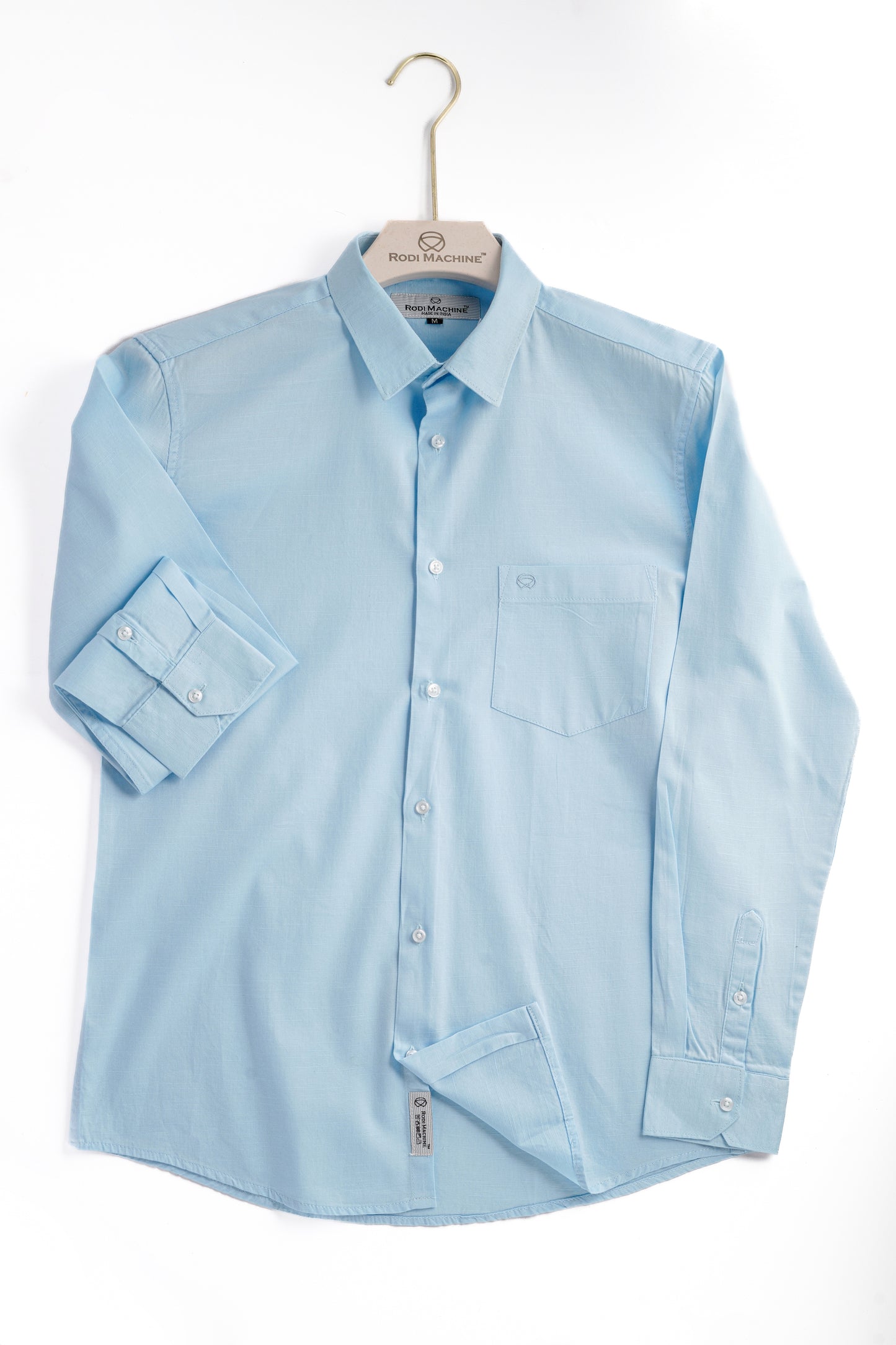 Sky Blue colour Rodi Machine shirt button-up shirt on a hanger against a white background