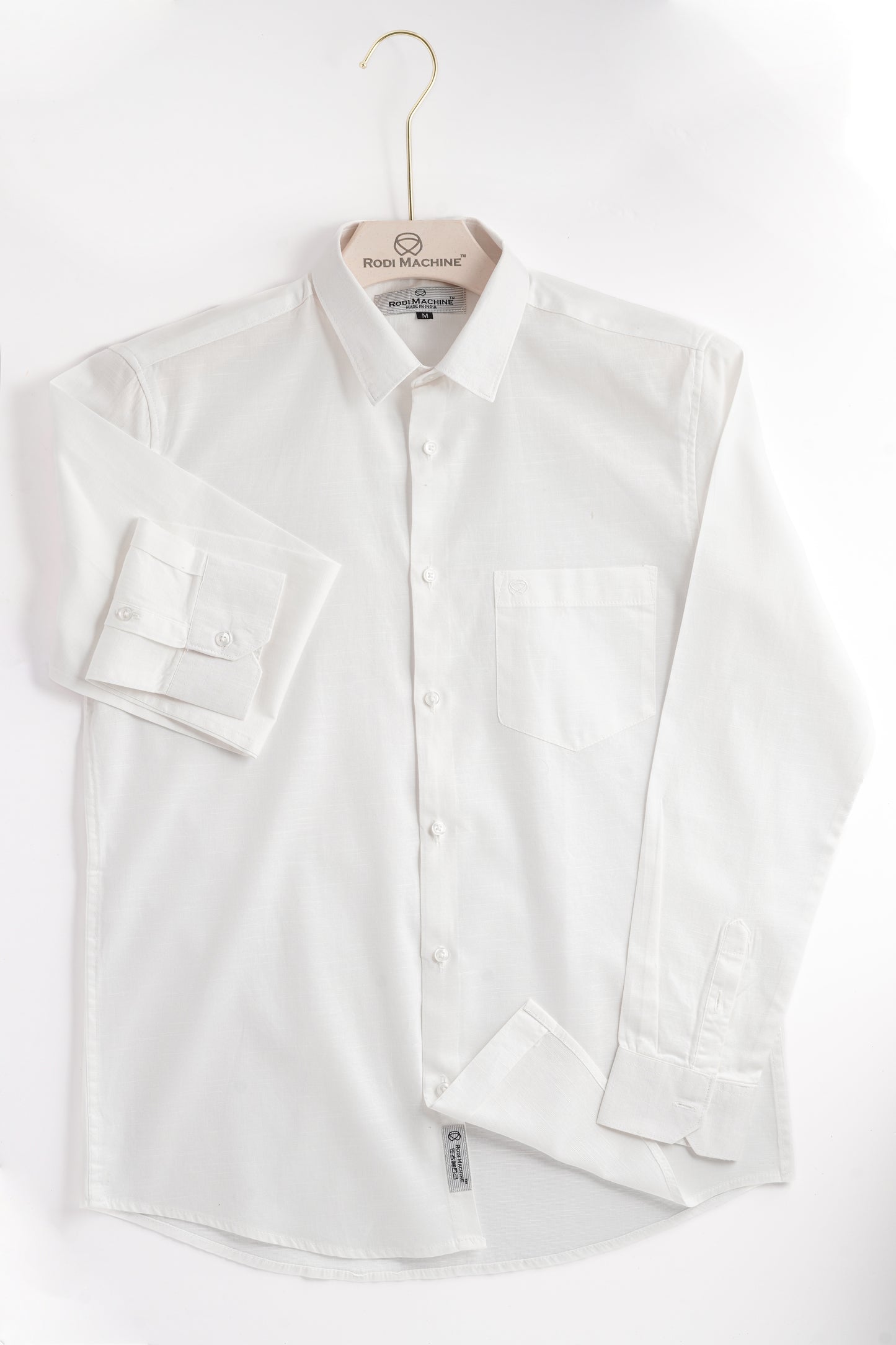 White colour Rodi Machine shirt on a hanger against a white background