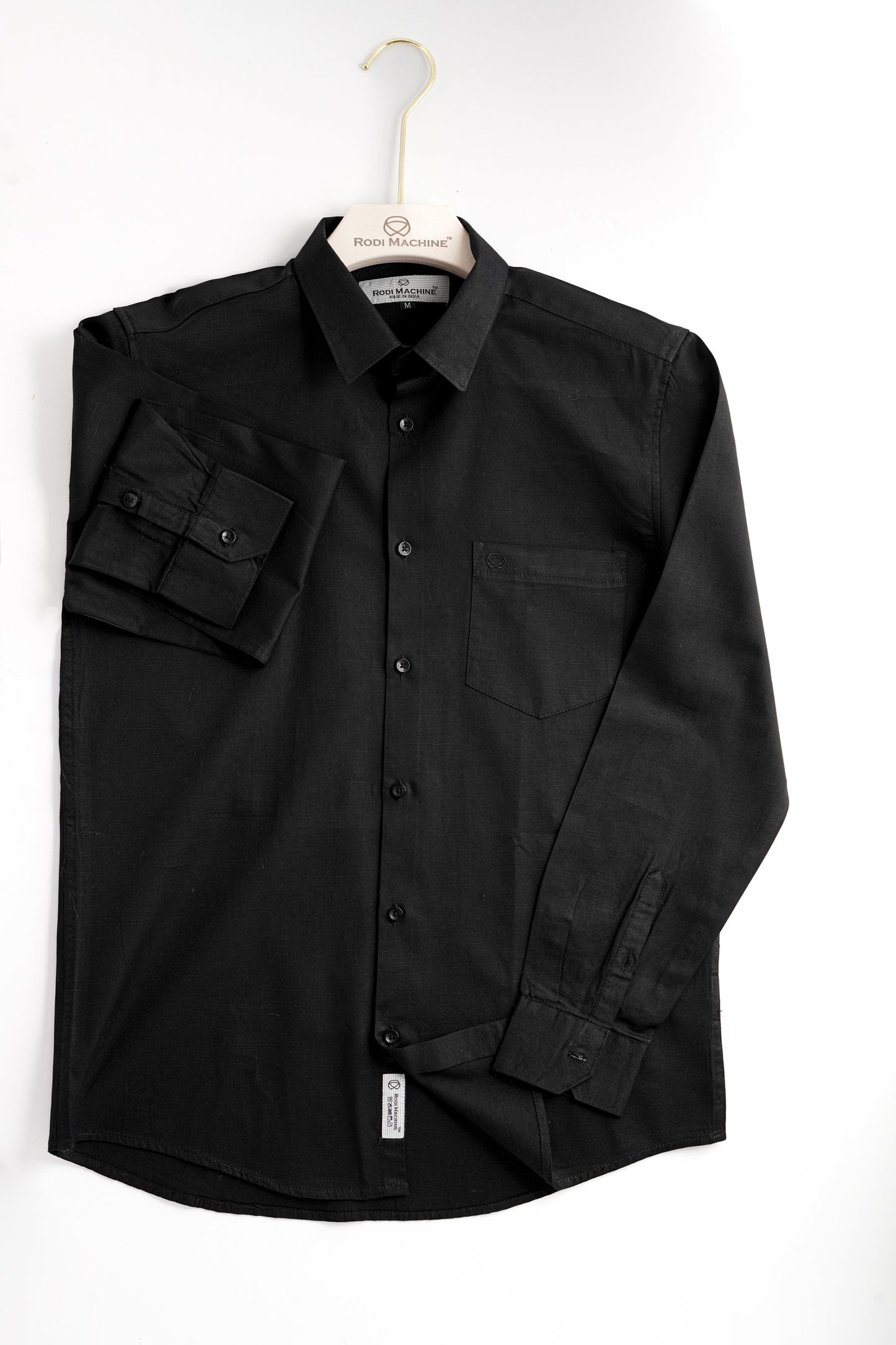  Black colour Rodi Machine shirt on a hanger against a white background
